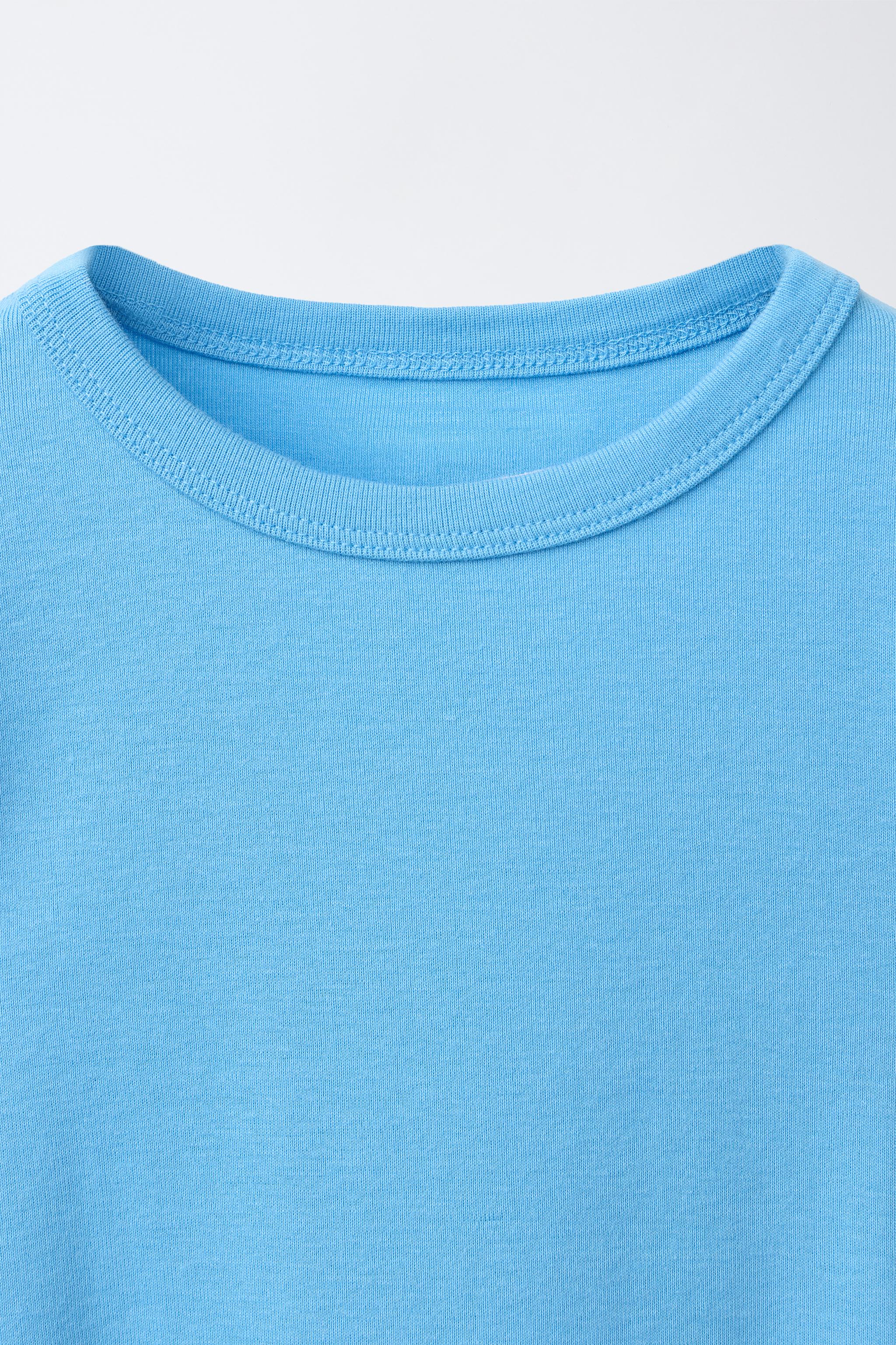 MODAL T-SHIRT WITH CUT OUTS AND BOWS